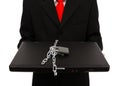 Man holding chained computer Royalty Free Stock Photo