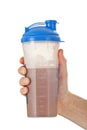 Man holding chocolate whey protein shake Royalty Free Stock Photo