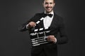 Man holding a clapboard Royalty Free Stock Photo