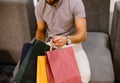 A man is holding colorful shopping bags Royalty Free Stock Photo