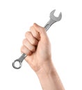 Man holding combination wrench isolated on white, closeup.