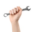 Man holding combination wrench on white, closeup. Plumbing tools