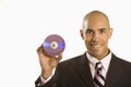 Man holding compact disc. Royalty Free Stock Photo