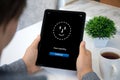 Man holding computer tablet with face ID scanning on screen Royalty Free Stock Photo