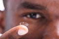 Man Holding Contact Lens In His Finger Royalty Free Stock Photo