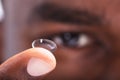 Man Holding Contact Lens In His Finger Royalty Free Stock Photo