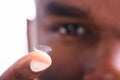 Man Holding Contact Lens In His Finger Royalty Free Stock Photo