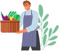 Man holding container with natural fresh food. Guy with basket of vegan fruits and vegetables