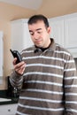 Man Holding Cordless Phone Royalty Free Stock Photo