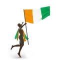 Man holding Cote d\'Ivoire flag