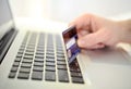 Man holding credit card in hand online shopping and banking Royalty Free Stock Photo