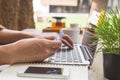 Man holding credit card and using laptop. Online shopping Royalty Free Stock Photo