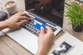 Man holding credit card and using laptop. Online shopping Royalty Free Stock Photo