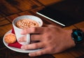 Man holding a cup of coffee