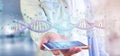 Man holding a 3d rendering data coded Dna with binary file around Royalty Free Stock Photo