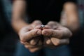 The diamond engagement ring in a hand