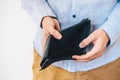 Man holding an empty wallet - economic crisis concept Royalty Free Stock Photo