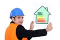 Man holding energy rating card Royalty Free Stock Photo