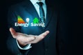 Man holding Energy Saving concept. Royalty Free Stock Photo