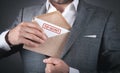 Man holding envelope with top secret stamp Royalty Free Stock Photo