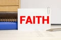 Man holding faith word in palm Royalty Free Stock Photo