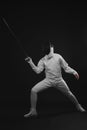 Man holding fencing foil