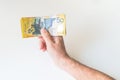 Man holding fifty Australian Dollar banknote Royalty Free Stock Photo