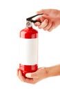 Man holding fire extinguisher isolated over white background, with clipping path Royalty Free Stock Photo