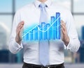 Man holding forex graph Royalty Free Stock Photo