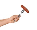 Man holding fork with grilled on white background, closeup. Barbecue food