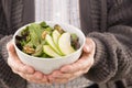 Man holding fresh fruit salad Royalty Free Stock Photo