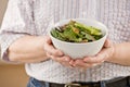 Man holding fresh fruit salad Royalty Free Stock Photo