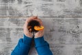 Man holding glass cup of delicious Christmas mulled wine in hand Royalty Free Stock Photo