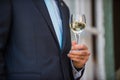 Man holding a glass of white wine Royalty Free Stock Photo