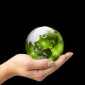 A man holding a globe on his hand Royalty Free Stock Photo