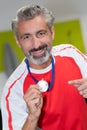 Man holding gold medal winner in competition Royalty Free Stock Photo