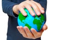 Man Holding Green-Continent Globe on White Background Royalty Free Stock Photo