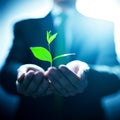 Man holding a green potted plant in his hands illuminated by sunlight, Ai-generated