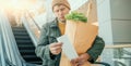 Man Checking Grocery List in Shopping Mall Royalty Free Stock Photo