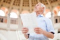 Man holding guide in museum Royalty Free Stock Photo