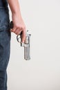 Man holding a gun in his hand Royalty Free Stock Photo