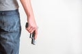 Man holding a gun in his hand Royalty Free Stock Photo