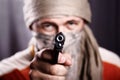 Man holding a gun Royalty Free Stock Photo