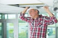 Man holding gypsum board figured cut Royalty Free Stock Photo