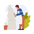 Man holding hammer to create statue of stone or marble, sculptor working