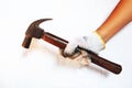 Man holding a hammer on a white background