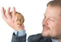 Man holding hamster on arm