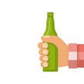 Man holding in hand green beer bottle Royalty Free Stock Photo