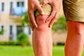 Man holding hand sore knee Royalty Free Stock Photo