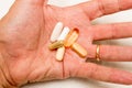 Man holding a handful of Vitamins Royalty Free Stock Photo